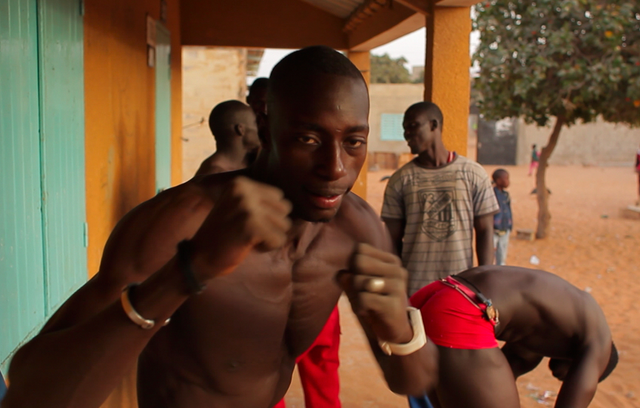 Lamine - Wrestling in Dakar by Edward Porembny